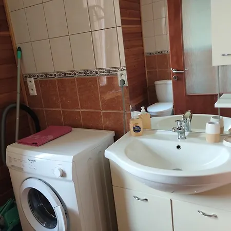 V Dřevěném Domě Apartmán *